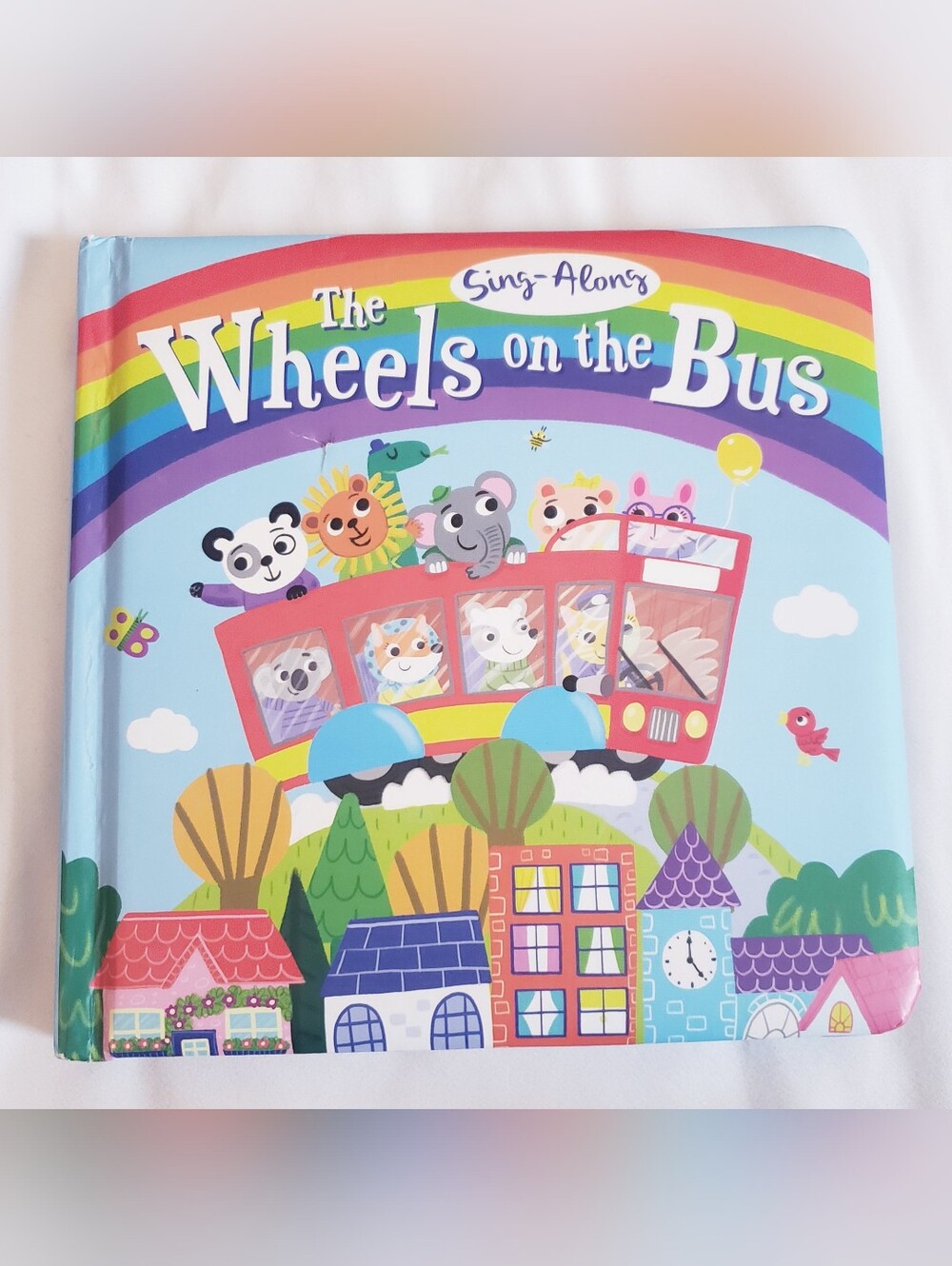 The Wheels on the Bus Sing-Along Kids Book Board Book